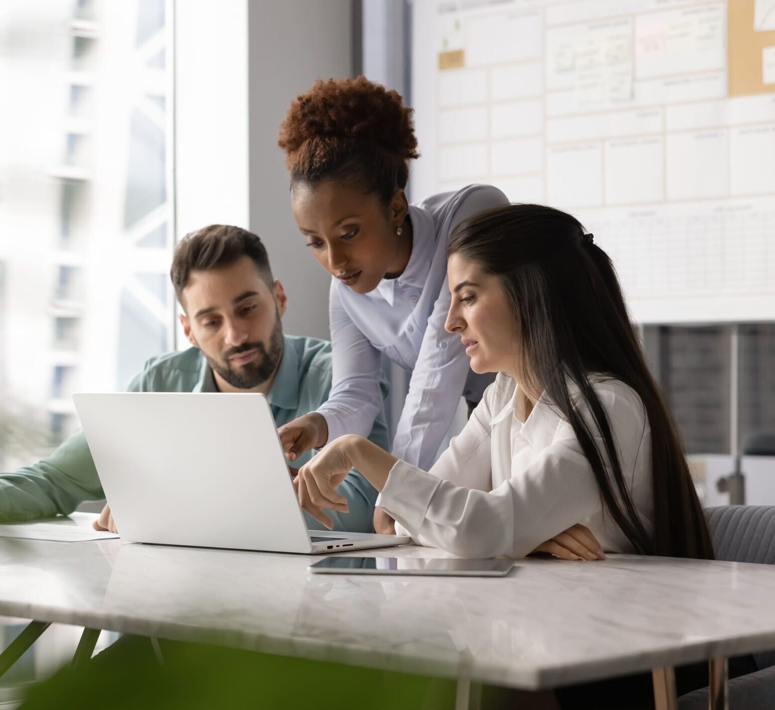 group of office colleagues discussing